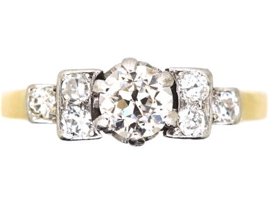 Art Deco 18ct Gold & Platinum, Diamond Solitaire Ring with Step Cut Shoulders set with Diamonds Art Deco 18ct Gold & Platinum, Diamond Solitaire Ring with Step Cut Shoulders set with Diamonds