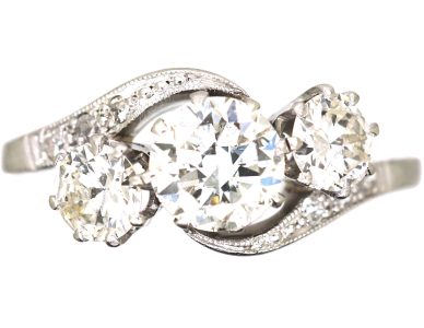 Edwardian Platinum Three Stone Diamond Crossover Ring with Diamond Set Shoulders Edwardian Platinum Three Stone Diamond Crossover Ring with Diamond Set Shoulders