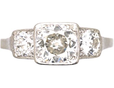 Art Deco Platinum Three Stone Diamond Ring with Step Cut Detail