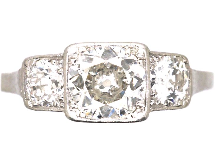 Art Deco Platinum Three Stone Diamond Ring with Step Cut Detail