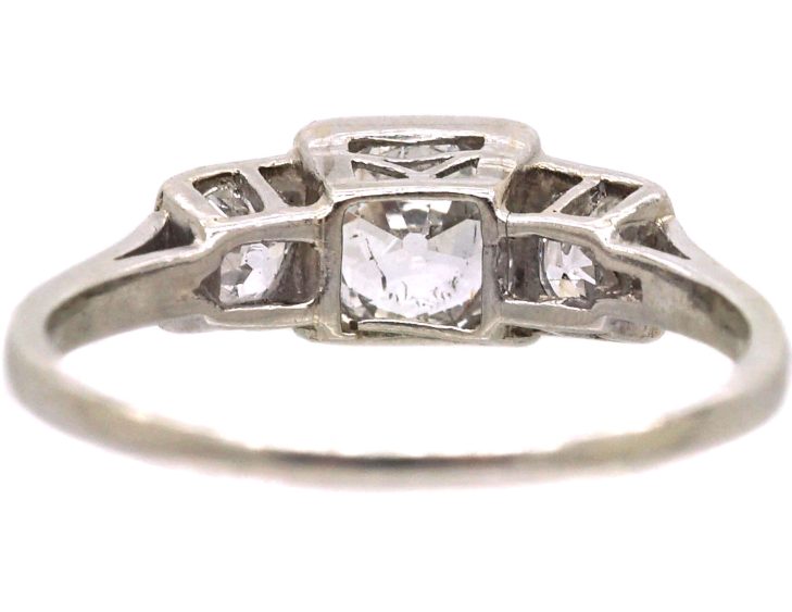 Art Deco Platinum Three Stone Diamond Ring with Step Cut Detail