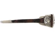 Art Deco Platinum Three Stone Diamond Ring with Step Cut Detail