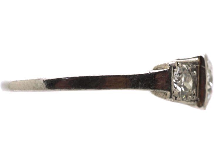 Art Deco Platinum Three Stone Diamond Ring with Step Cut Detail