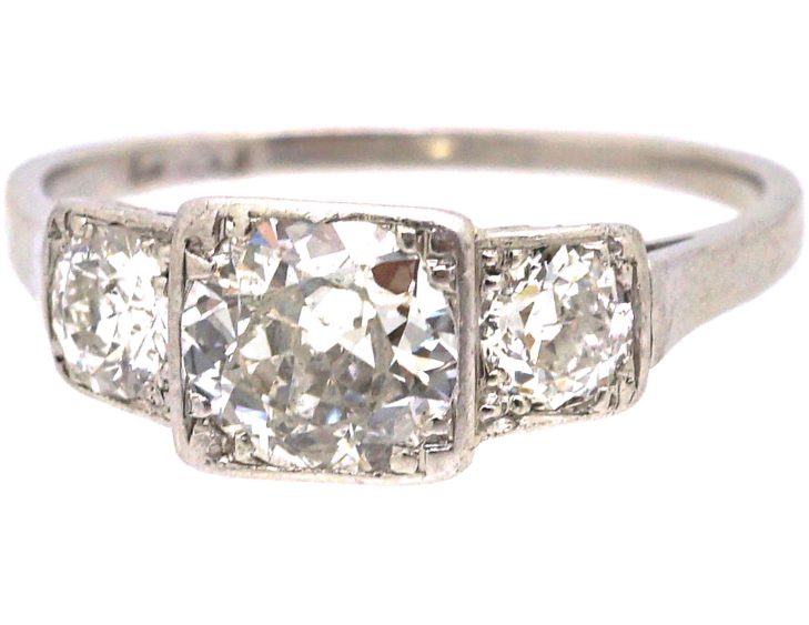 Art Deco Platinum Three Stone Diamond Ring with Step Cut Detail