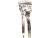Art Deco Platinum Three Stone Diamond Ring with Step Cut Detail