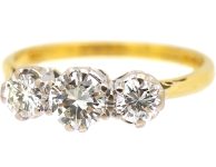 18K 金三石明亮式切工钻石戒指
